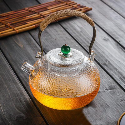 Bule de vidro do espaço livre resistente ao calor do esmalte para o tamanho de florescência do costume do chá/café fornecedor