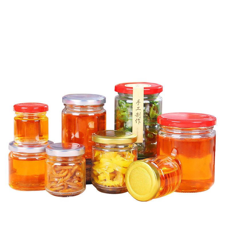 Frasco de vidro do mel da etiqueta sem chumbo do selo com forma redonda de produto comestível da tampa da lata fornecedor