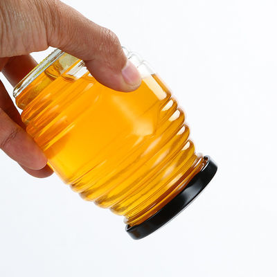 A forma da abelha poucos frascos do vidro, gosta rosqueado em volta do frasco de vidro com tampa fornecedor