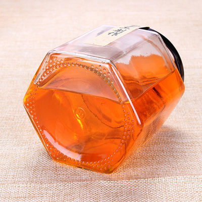 Forma sextavada do frasco de vidro empilhável feito a mão do doce pequena para o armazenamento do alimento fornecedor